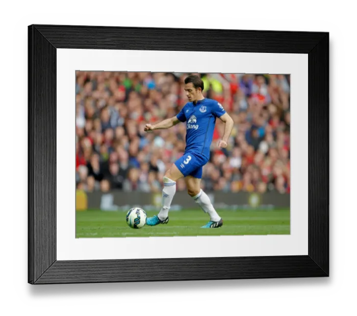 Framed Print : Clash at Old Trafford: Leighton Baines vs. Manchester United Framed Print : Clash at Old Trafford: Leighton Baines vs. Manchester United