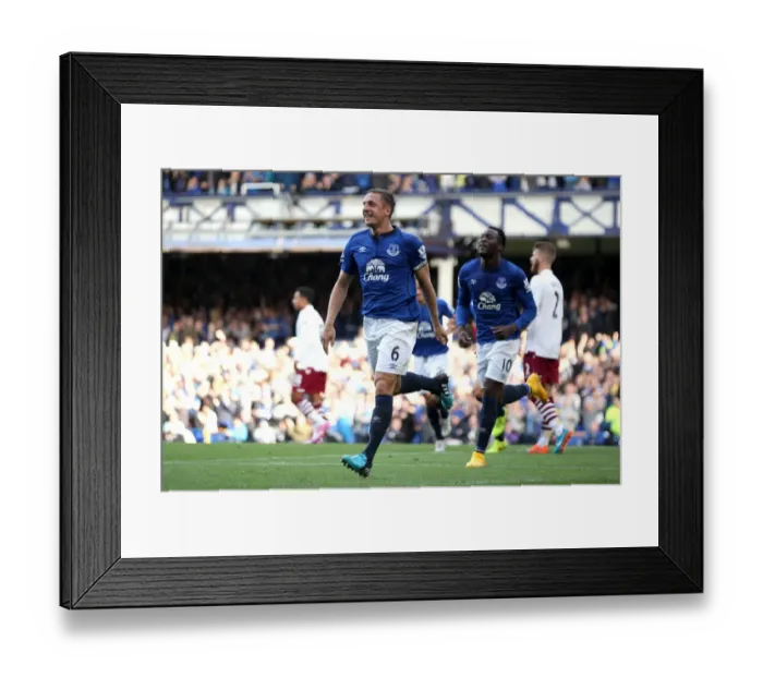 Framed Print : Phil Jagielka's Thunderbolt: Everton's Historic First Goal vs. Aston Villa in Premier League Framed Print : Phil Jagielka's Thunderbolt: Everton's Historic First Goal vs. Aston Villa in Premier League