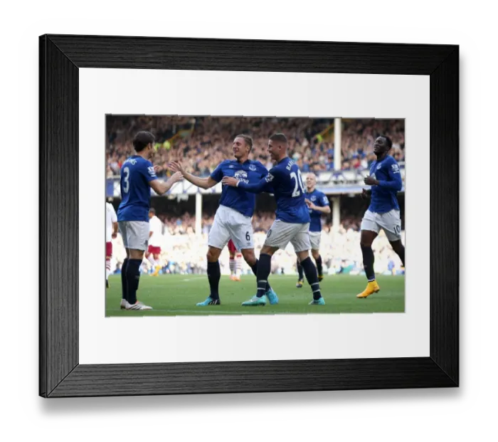 Framed Print : Phil Jagielka's Thriller: Everton's Opening Goal in Premier League Clash Against Aston Villa at Goodison Park