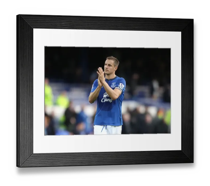 Framed Print : Everton's Phil Jagielka: A Heartfelt Celebration with Fans after Securing a Hard-Fought Victory vs. Aston Villa (BPL) Framed Print : Everton's Phil Jagielka: A Heartfelt Celebration with Fans after Securing a Hard-Fought Victory vs. Aston Villa (BPL)