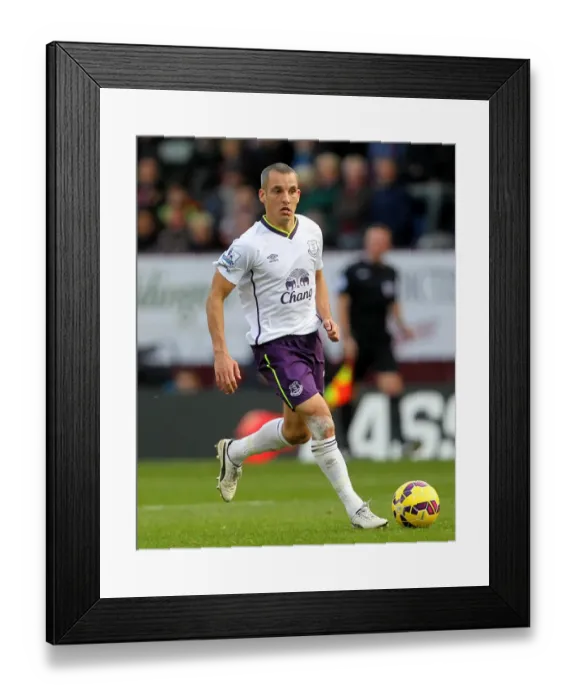 Framed Print : Everton's Leon Osman in Action against Burnley, Barclays Premier League, 2014 Framed Print : Everton's Leon Osman in Action against Burnley, Barclays Premier League, 2014