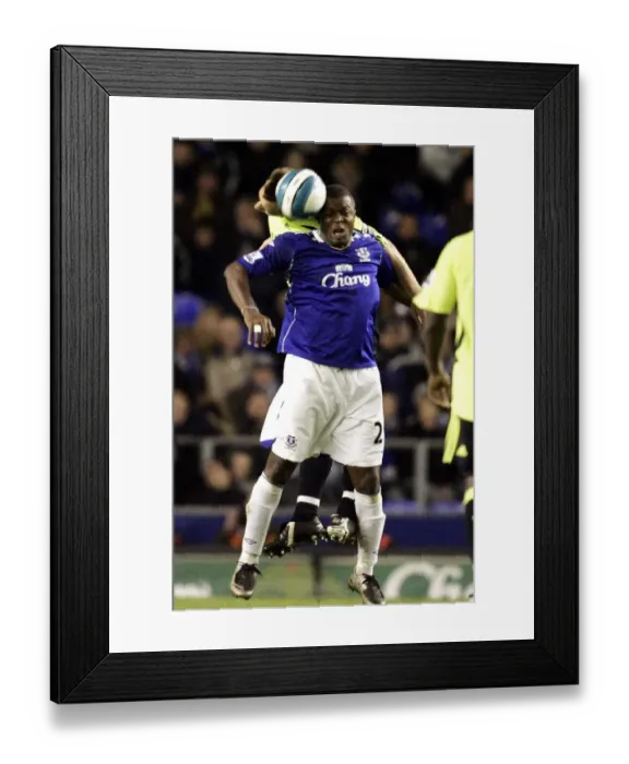 Framed Print : Everton's Yakubu vs. Chelsea's John Terry: Intense Clash in Premier League Match at Goodison Park (17 / 04 / 08) Framed Print : Everton's Yakubu vs. Chelsea's John Terry: Intense Clash in Premier League Match at Goodison Park (17 / 04 / 08)