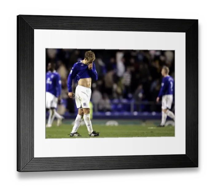 Framed Print : Football - Everton v Chelsea Barclays Premier League - Goodison Park - 17 / 4 / 08 Evertons Phil Neville looks dejected at full time Mandatory Credit: Action Images / Keith Williams Livepic NO ONLINE / INTERNET USE WITHOUT A LICENCE FROM THE FOOTBALL Framed Print : Football - Everton v Chelsea Barclays Premier League - Goodison Park - 17 / 4 / 08 Evertons Phil Neville looks dejected at full time Mandatory Credit: Action Images / Keith Williams Livepic NO ONLINE / INTERNET USE WITHOUT A LICENCE FROM THE FOOTBALL