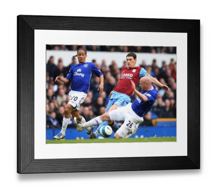 Framed Print : Football - Everton v Aston Villa Barclays Premier League - Goodison Park - 27 / 4 / 08 Evertons Lee Carsley (R) in action with Gareth Barry of Aston Villa (C) as Steven Pienaar (L) looks on Mandatory Credit: Action Images / Scott Heavey Livepic NO O Framed Print : Football - Everton v Aston Villa Barclays Premier League - Goodison Park - 27 / 4 / 08 Evertons Lee Carsley (R) in action with Gareth Barry of Aston Villa (C) as Steven Pienaar (L) looks on Mandatory Credit: Action Images / Scott Heavey Livepic NO O