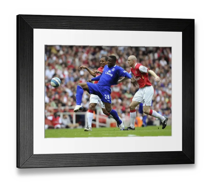 Framed Print : Intense Clash: Anichebe vs Senderos and Silva - Arsenal vs Everton, Barclays Premier League (2008) Framed Print : Intense Clash: Anichebe vs Senderos and Silva - Arsenal vs Everton, Barclays Premier League (2008)