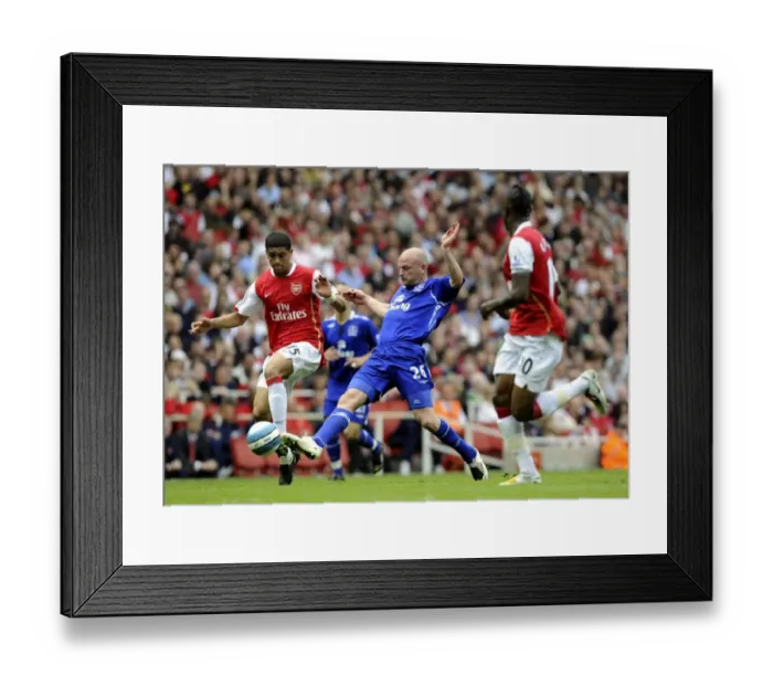 Framed Print : Denilson vs. Carsley: Intense Rivalry in the Arsenal vs. Everton Premier League Clash at Emirates Stadium (April 5, 2008)
