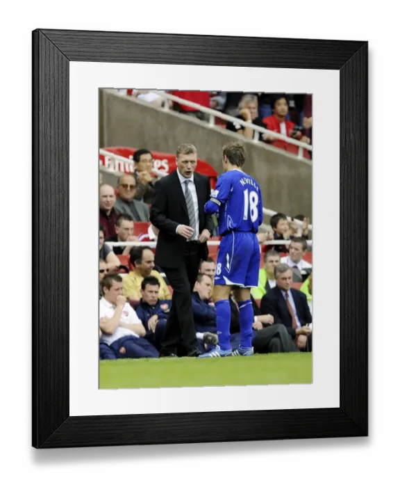Framed Print : David Moyes Consults with Phil Neville during Arsenal vs. Everton (2008) Premier League Match Framed Print : David Moyes Consults with Phil Neville during Arsenal vs. Everton (2008) Premier League Match