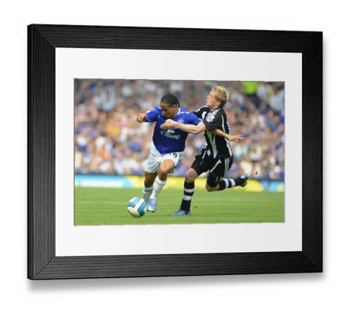 Framed Print : Football - Everton v Newcastle United Barclays Premier League - Goodison Park - 11  /  5  /  08 Evertons Steven Pienaar (L) in action with Newcastle Uniteds Damien Duff Mandatory Credit: Action Images  /  Keith Williams Livepic NO ONLINE  /  INTERNET USE