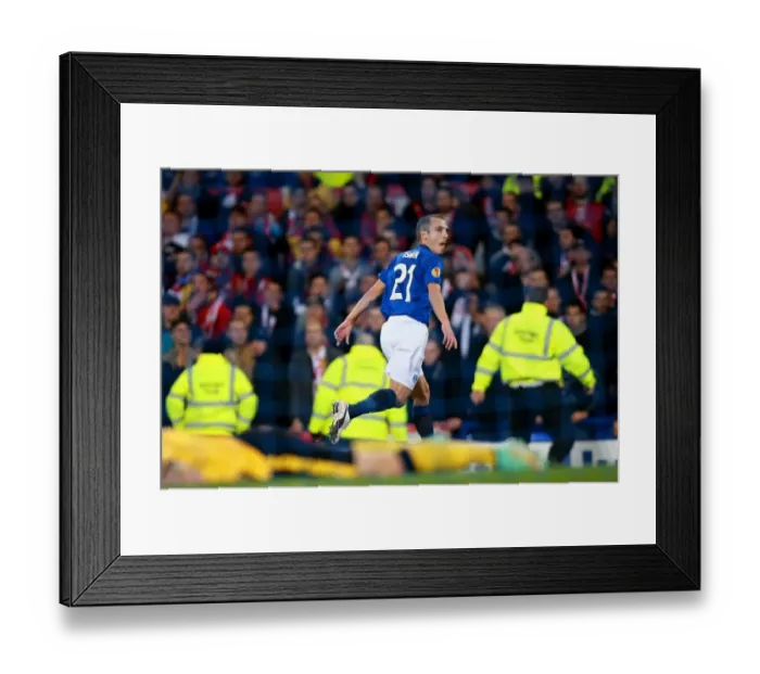 Framed Print : Everton's Leon Osman Scores Historic Goal in Europa League Clash Against Lille Framed Print : Everton's Leon Osman Scores Historic Goal in Europa League Clash Against Lille