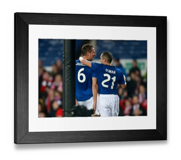 Framed Print : Everton's Jagielka and Osman Celebrate Second Goal in Europa League Match vs. Lille