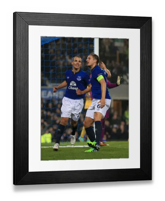 Framed Print : Double the Joy: Jagielka and Osman's Europa League Goal Celebration for Everton Framed Print : Double the Joy: Jagielka and Osman's Europa League Goal Celebration for Everton
