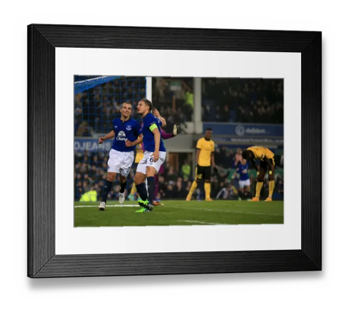Framed Print : Everton's Jagielka and Osman: Double Delight in Europa League Victory Framed Print : Everton's Jagielka and Osman: Double Delight in Europa League Victory