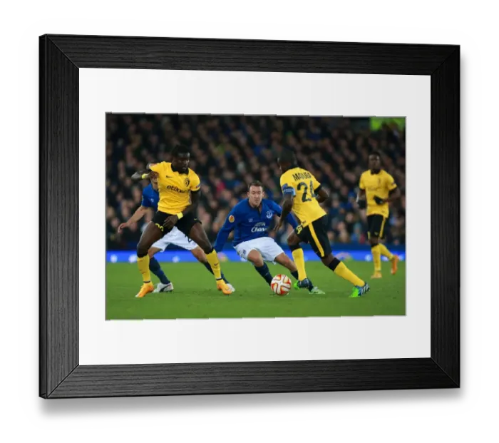 Framed Print : Everton's Aiden McGeady Fights for Possession in Europa League Clash vs Lille Framed Print : Everton's Aiden McGeady Fights for Possession in Europa League Clash vs Lille
