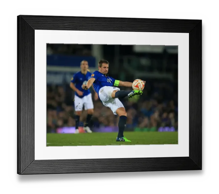 Framed Print : Jagielka's Europa League Battle: Everton vs Lille at Goodison Park