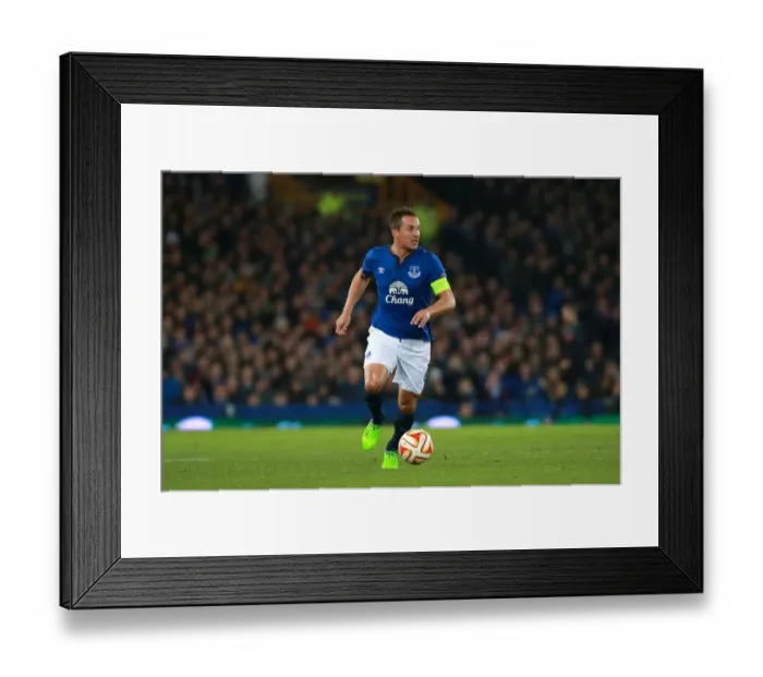 Framed Print : Everton's Jagielka in Europa League Action Framed Print : Everton's Jagielka in Europa League Action