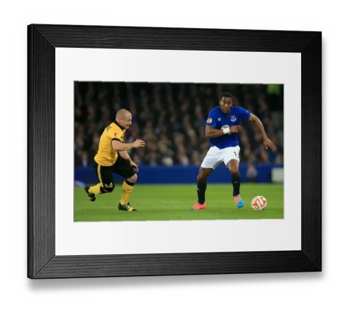Framed Print : Everton vs Lille: A Battle of Balmont and Distin in Europa League at Goodison Park Framed Print : Everton vs Lille: A Battle of Balmont and Distin in Europa League at Goodison Park