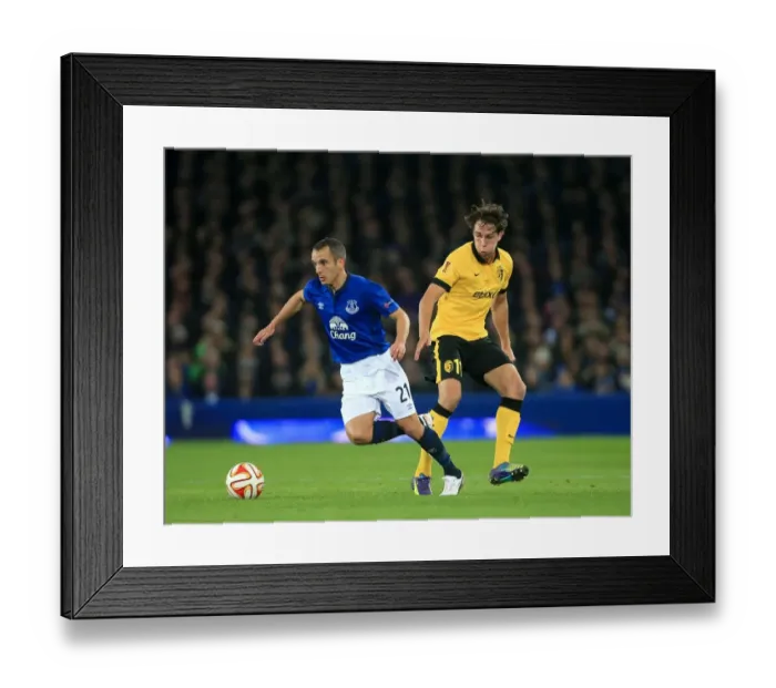 Framed Print : Battle for the Ball: Everton vs Lille - UEFA Europa League Group H Framed Print : Battle for the Ball: Everton vs Lille - UEFA Europa League Group H