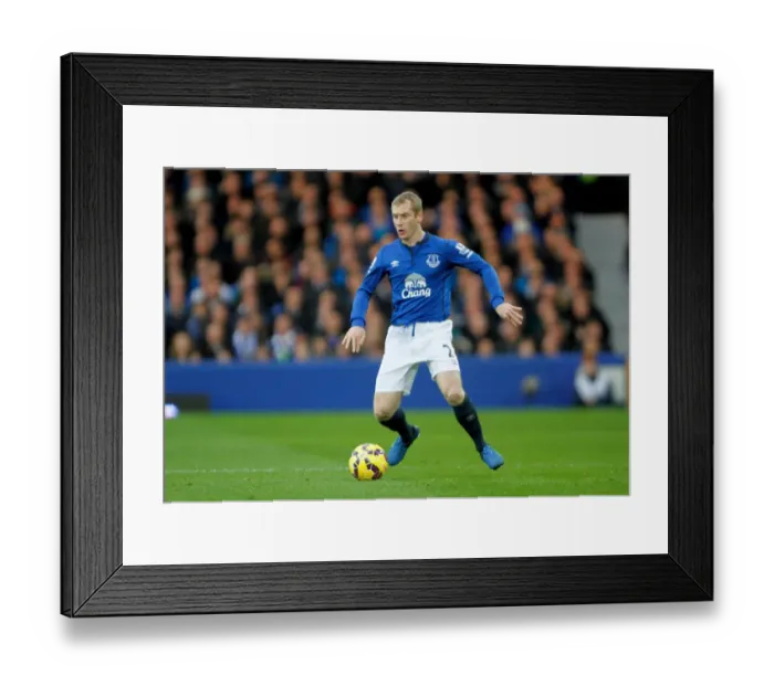 Framed Print : Everton vs West Ham United: Tony Hibbert's Battle at Goodison Park - Barclays Premier League Framed Print : Everton vs West Ham United: Tony Hibbert's Battle at Goodison Park - Barclays Premier League