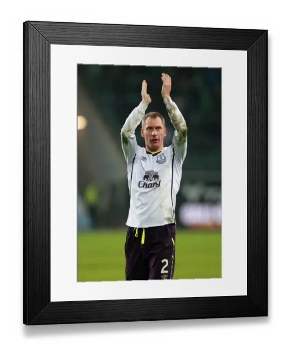 Framed Print : Everton's Europa League Triumph: Tony Hibbert's Euphoric Victory Celebration vs. VfL Wolfsburg