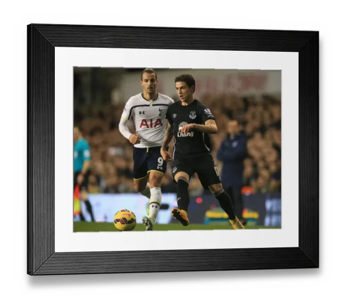 Framed Print : Battling for the Ball: Soldado vs. Besic - Premier League Showdown between Tottenham Hotspur and Everton Framed Print : Battling for the Ball: Soldado vs. Besic - Premier League Showdown between Tottenham Hotspur and Everton