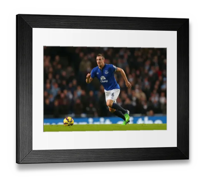 Framed Print : Phil Jagielka at Etihad Stadium: Manchester City vs. Everton - Barclays Premier League Framed Print : Phil Jagielka at Etihad Stadium: Manchester City vs. Everton - Barclays Premier League