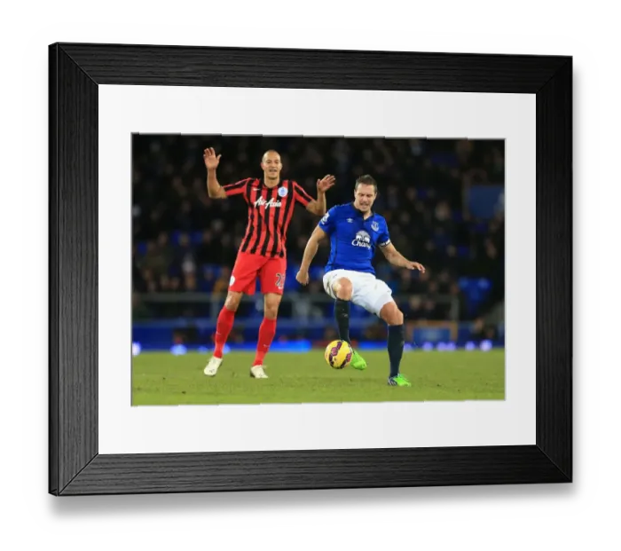 Framed Print : Battle for the Ball: Jagielka vs. Zamora - Everton vs. Queens Park Rangers, Premier League Rivalry Framed Print : Battle for the Ball: Jagielka vs. Zamora - Everton vs. Queens Park Rangers, Premier League Rivalry