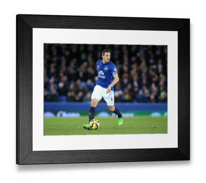 Framed Print : Phil Jagielka in Action: Everton vs. Queens Park Rangers (December 2014)