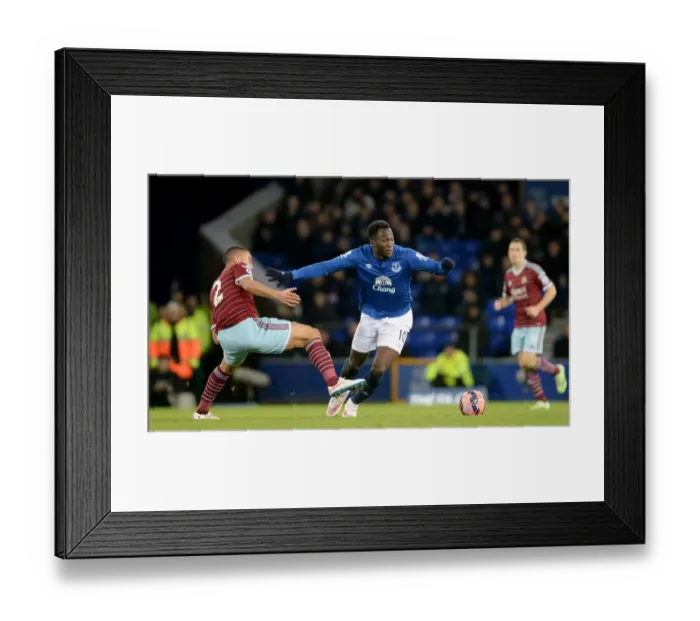 Framed Print : Lukaku vs Reid: FA Cup Third Round Battle at Goodison Park - Everton vs West Ham Framed Print : Lukaku vs Reid: FA Cup Third Round Battle at Goodison Park - Everton vs West Ham