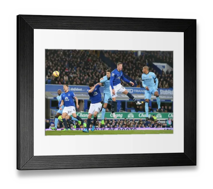 Framed Print : Ross Barkley Goes Airborne: Everton vs Manchester City Clash at Goodison Park Framed Print : Ross Barkley Goes Airborne: Everton vs Manchester City Clash at Goodison Park