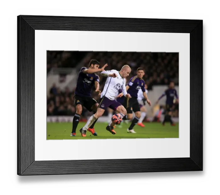 Framed Print : Naismith vs. Tomkins: A FA Cup Showdown - Everton's Steven Naismith and West Ham United's James Tomkins in an Intense Battle for the Ball Framed Print : Naismith vs. Tomkins: A FA Cup Showdown - Everton's Steven Naismith and West Ham United's James Tomkins in an Intense Battle for the Ball