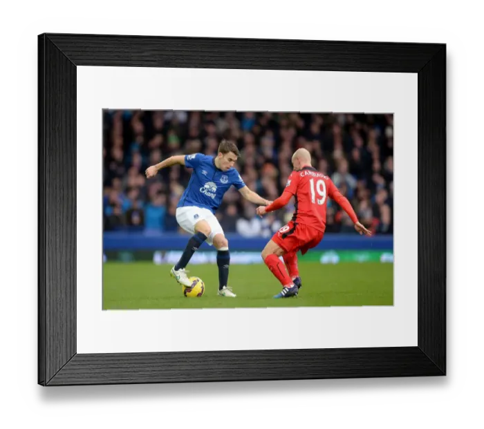 Framed Print : Battle at Goodison Park: Coleman vs. Cambiasso - Everton vs. Leicester City Premier League Clash Framed Print : Battle at Goodison Park: Coleman vs. Cambiasso - Everton vs. Leicester City Premier League Clash
