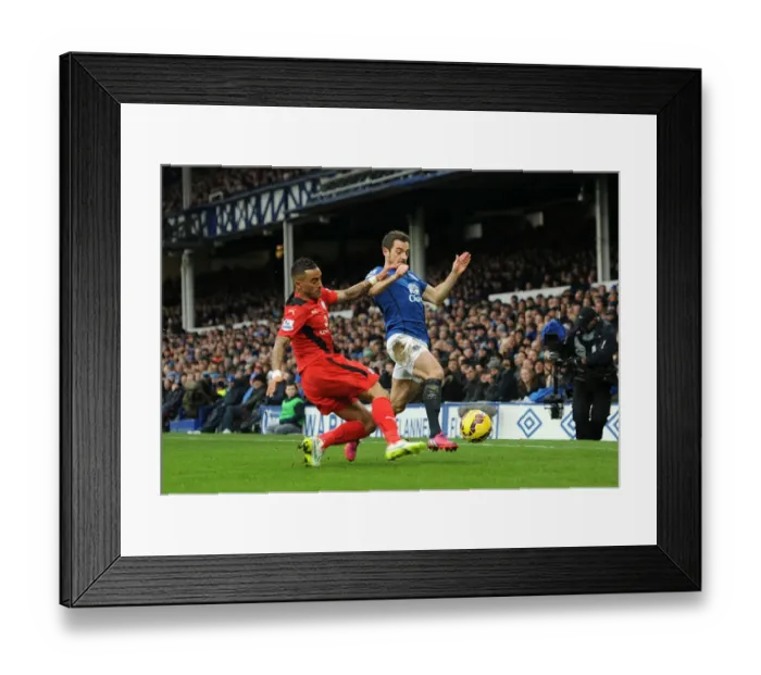 Framed Print : Intense Rivalry: Leighton Baines vs. Danny Simpson - Everton vs. Leicester City, Premier League Battle for the Ball