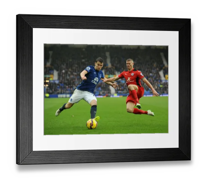 Framed Print : Sliding Showdown: Coleman vs. Konchesky at Goodison Park Framed Print : Sliding Showdown: Coleman vs. Konchesky at Goodison Park
