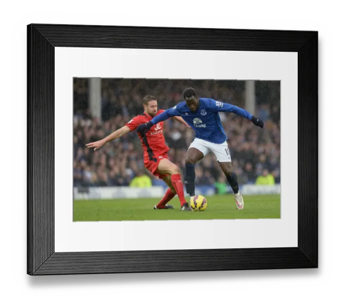 Framed Print : Lukaku vs Upson: A Premier League Battle for the Ball