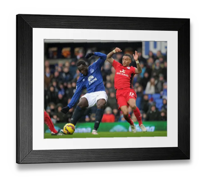 Framed Print : Intense Battle for Ball Possession: Lukaku vs. Simpson at Goodison Park Framed Print : Intense Battle for Ball Possession: Lukaku vs. Simpson at Goodison Park