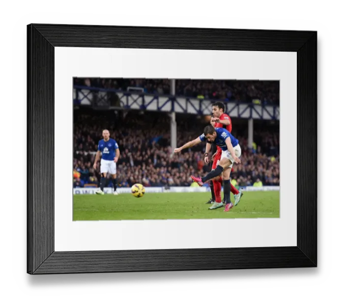 Framed Print : Everton's Leighton Baines Unleashes a Powerful Shot vs Leicester City at Goodison Park Framed Print : Everton's Leighton Baines Unleashes a Powerful Shot vs Leicester City at Goodison Park
