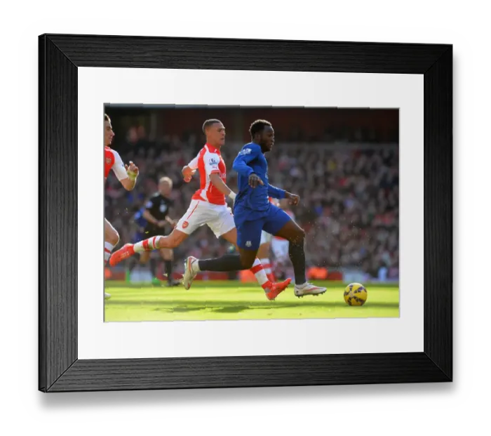 Framed Print : Premier League Showdown: Gibbs Chases Lukaku at Emirates Stadium - Arsenal vs. Everton Framed Print : Premier League Showdown: Gibbs Chases Lukaku at Emirates Stadium - Arsenal vs. Everton
