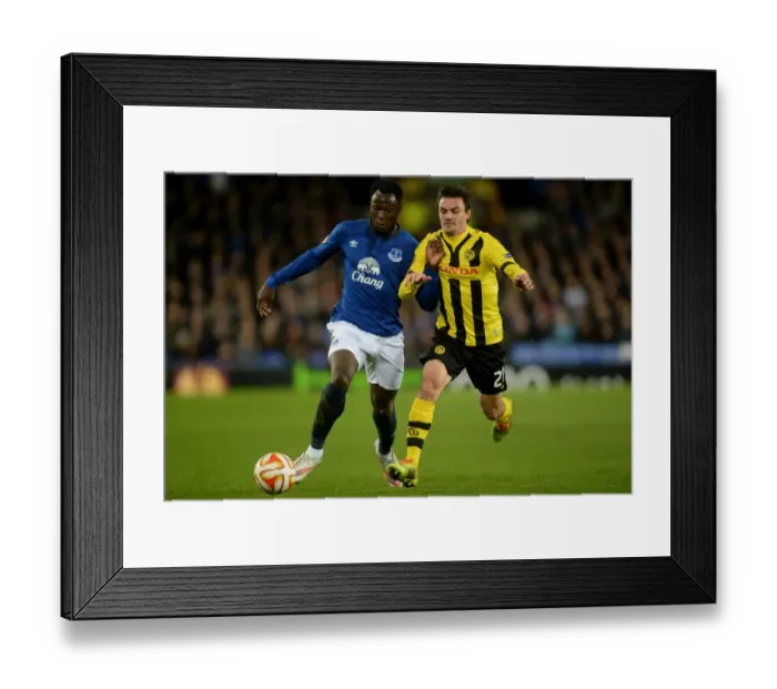 Framed Print : Everton's Lukaku vs Rochat: Intense Battle in Europa League Clash at Goodison Park