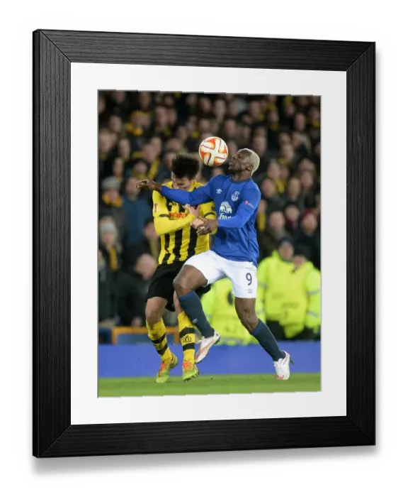 Framed Print : Europa League Showdown: Arouna Kone vs Alain Rochat Clash at Goodison Park Framed Print : Europa League Showdown: Arouna Kone vs Alain Rochat Clash at Goodison Park