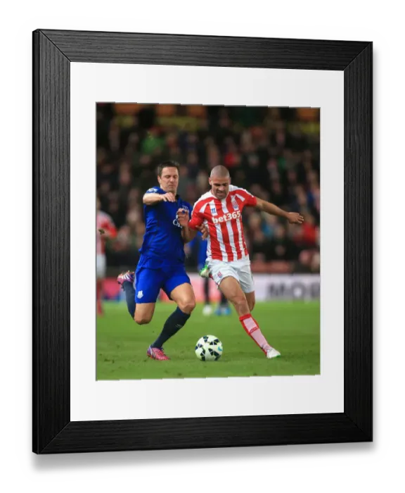 Framed Print : Battle for the Ball: Jagielka vs. Walters - Stoke City vs. Everton, Premier League Framed Print : Battle for the Ball: Jagielka vs. Walters - Stoke City vs. Everton, Premier League