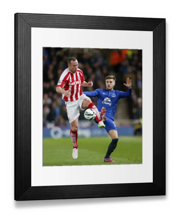 Framed Print : Battle for the Ball: Charlie Adam vs. Luke Garbutt - Everton vs. Stoke City, Premier League Framed Print : Battle for the Ball: Charlie Adam vs. Luke Garbutt - Everton vs. Stoke City, Premier League