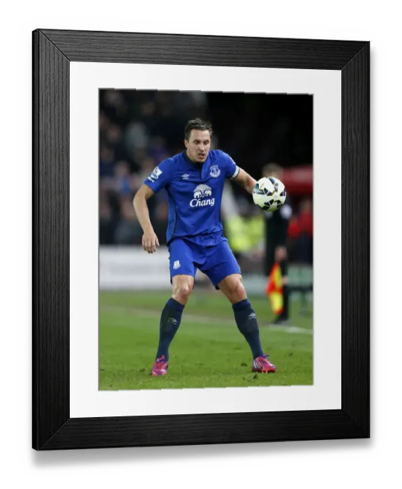 Framed Print : Phil Jagielka in Action: Everton vs Stoke City, Premier League - Britannia Stadium Framed Print : Phil Jagielka in Action: Everton vs Stoke City, Premier League - Britannia Stadium