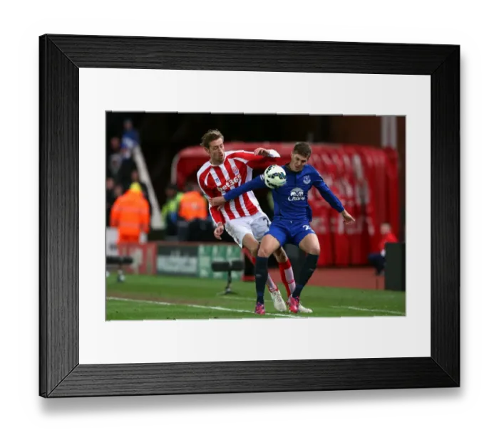 Framed Print : Battle for the Ball: Crouch vs. Stones - Everton vs. Stoke City, Premier League Framed Print : Battle for the Ball: Crouch vs. Stones - Everton vs. Stoke City, Premier League
