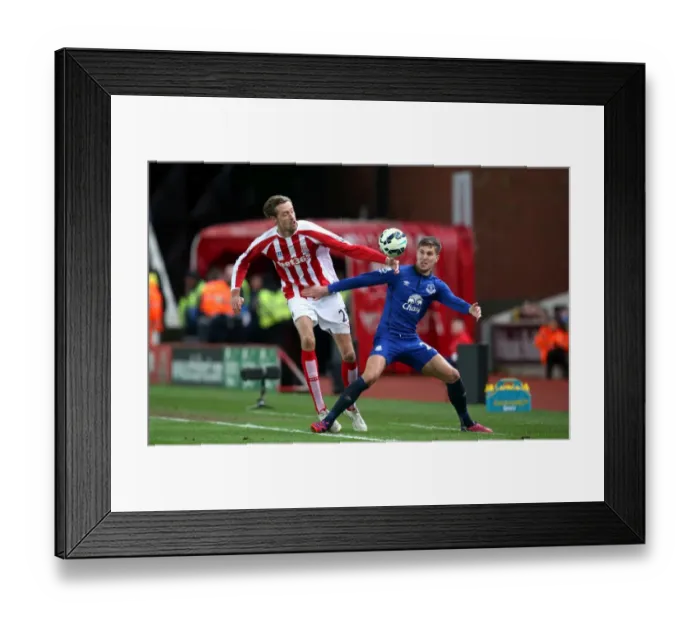 Framed Print : Battle for the Ball: Crouch vs. Stones - Stoke City vs. Everton, Premier League Framed Print : Battle for the Ball: Crouch vs. Stones - Stoke City vs. Everton, Premier League