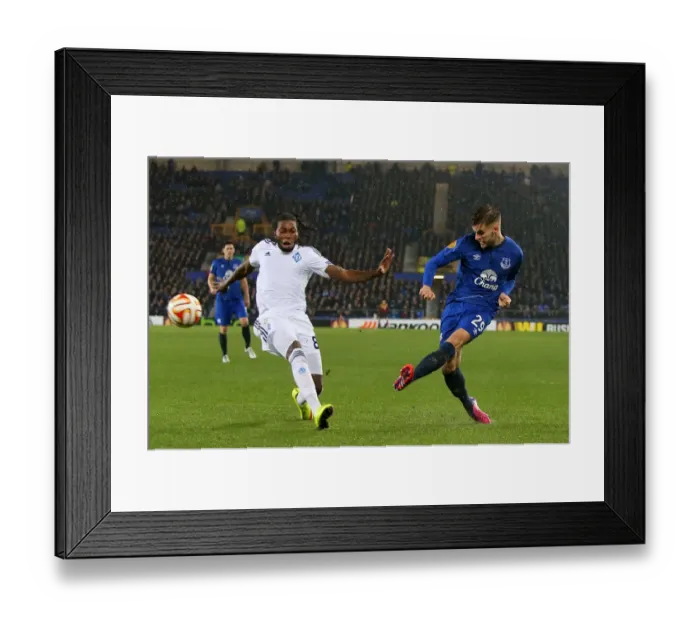 Framed Print : Everton vs Dynamo Kiev: Garbutt vs Mbokani Clash in Europa League Round of 16 First Leg at Goodison Park Framed Print : Everton vs Dynamo Kiev: Garbutt vs Mbokani Clash in Europa League Round of 16 First Leg at Goodison Park