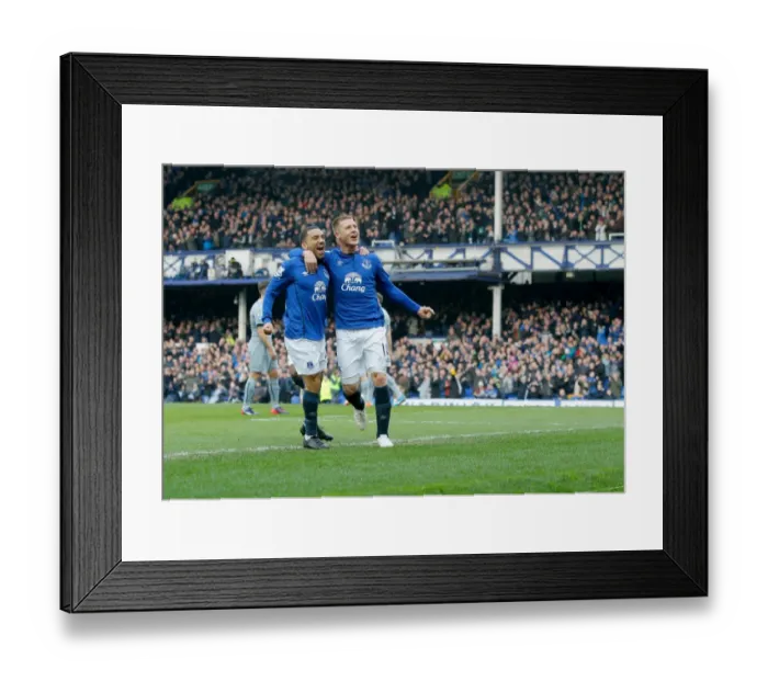 Framed Print : Everton's McCarthy and Lennon: A Thrilling Moment of Celebration after Scoring against Newcastle United at Goodison Park (BPL)