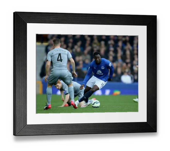 Framed Print : Everton's Lukaku Outmaneuvers Newcastle's Defenders: A Dazzling Moment at Goodison Park