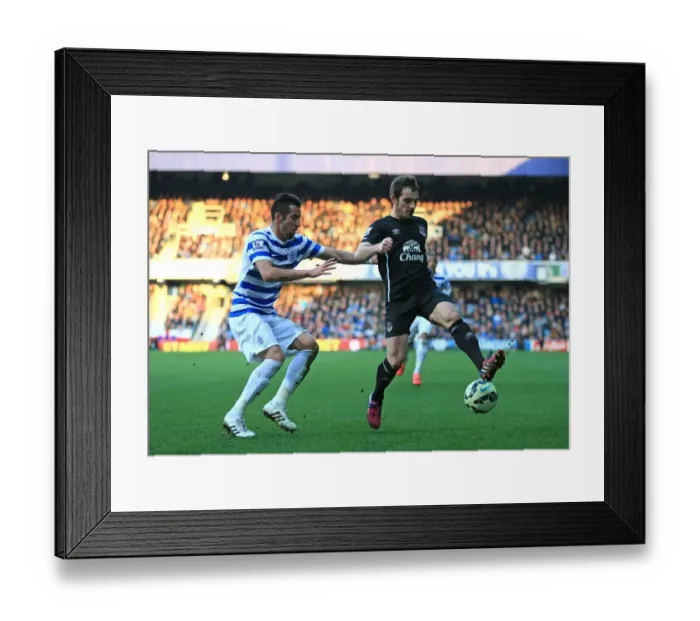 Framed Print : Intense Battle for Ball Possession: Baines vs. Isla, Queens Park Rangers vs. Everton Framed Print : Intense Battle for Ball Possession: Baines vs. Isla, Queens Park Rangers vs. Everton