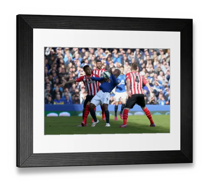 Framed Print : Everton vs Southampton: Arouna Kone and Ryan Bertrand Engage in Intense Battle for Ball Framed Print : Everton vs Southampton: Arouna Kone and Ryan Bertrand Engage in Intense Battle for Ball
