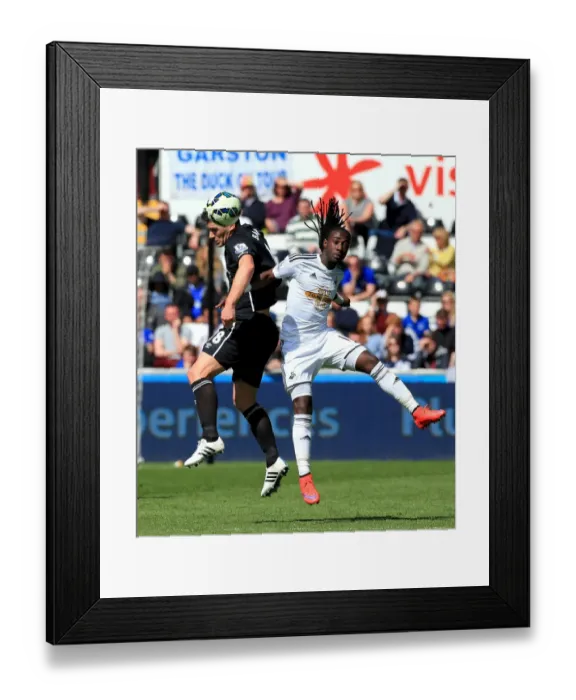 Framed Print : Intense Rivalry: Barry vs Emnes in Swansea City vs Everton (Barclays Premier League) Framed Print : Intense Rivalry: Barry vs Emnes in Swansea City vs Everton (Barclays Premier League)